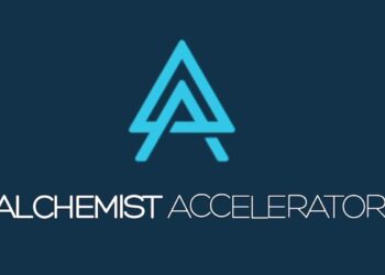 Cover image for the article 'How to Get Accepted to Alchemist Accelerator' featuring a group of startup founders collaborating in a modern co-working space, symbolizing innovation, mentorship, and business growth in a structured accelerator program.