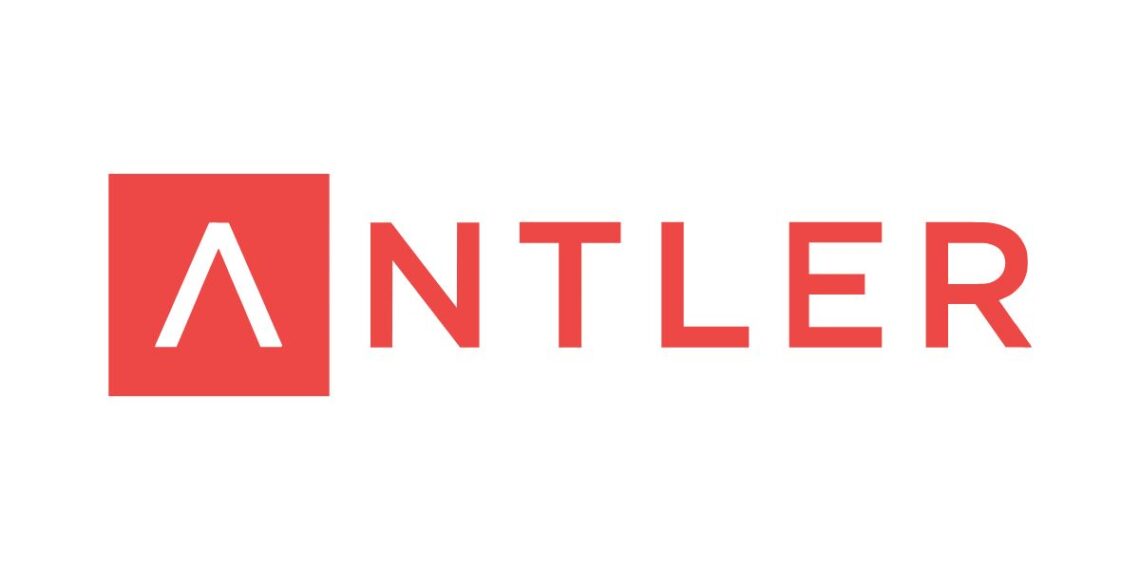 A dynamic image representing the Antler Accelerator, featuring entrepreneurs collaborating, networking, and pitching their ideas in a professional setting.