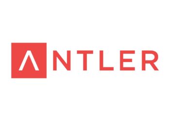 A dynamic image representing the Antler Accelerator, featuring entrepreneurs collaborating, networking, and pitching their ideas in a professional setting.