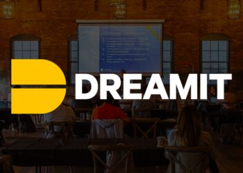 Dreamit Accelerator's office exterior with the company logo displayed prominently on the building, showcasing a modern workspace environment.