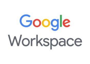A modern workspace with a laptop displaying Google Workspace apps like Gmail, Drive, and Meet, symbolizing productivity and collaboration.