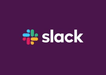 Cover image for 'Slack for Startups: Does It Fit Your Needs?' showing a startup team using Slack for real-time communication and collaboration.