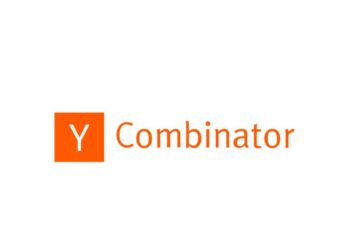 A vibrant and dynamic image representing Y Combinator Accelerator, featuring startup founders collaborating, coding, and pitching their ideas in a high-energy environment, symbolizing innovation, mentorship, and funding opportunities.
