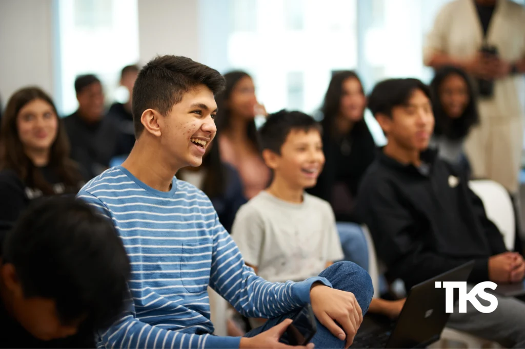 get into HF0 program classroom with students engaged and smiling during a fast-paced learning session