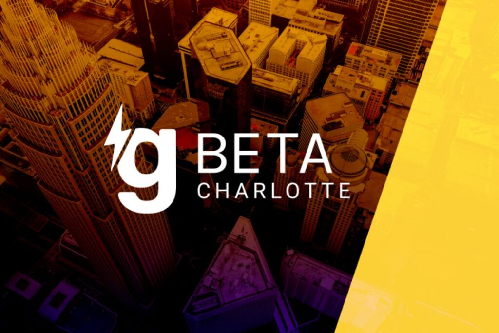 Inside the gBETA office featuring open workspaces, desks, and startup teams collaborating.