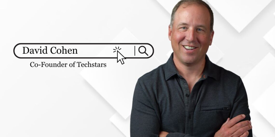David Cohen smiling in a professional setting, representing his role as the co-founder of Techstars.