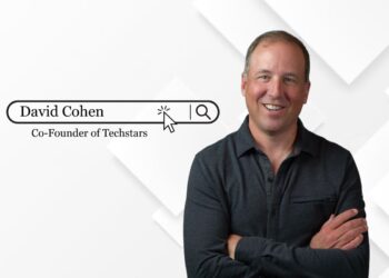 David Cohen smiling in a professional setting, representing his role as the co-founder of Techstars.