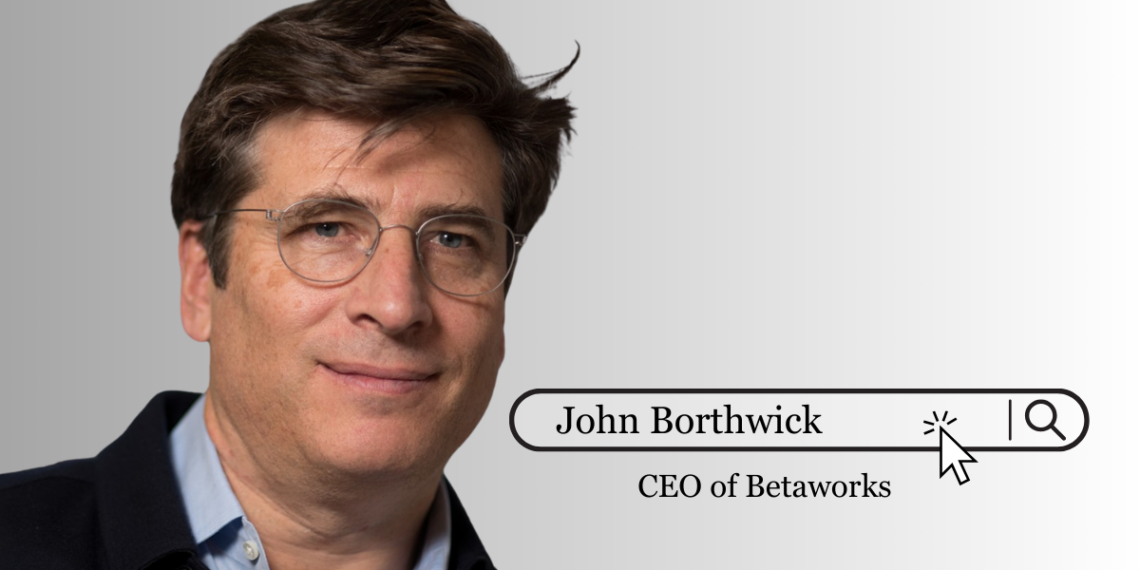 John Borthwick, CEO of Betaworks, standing in a modern workspace environment, representing the face of the Betaworks startup studio.