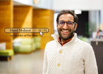 Portrait of Sheel Mohnot, co-founder of The Mint accelerator, smiling confidently against a fintech-themed background.