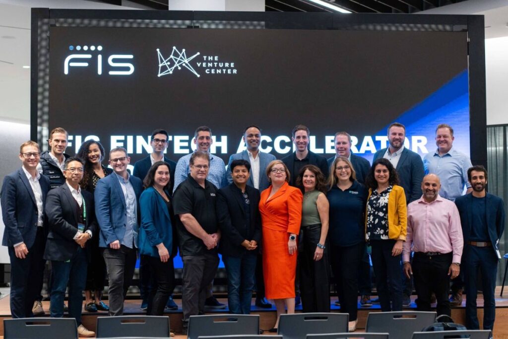 Startup team meeting with mentors at the FIS Fintech Accelerator, a program offering PoC funding and enterprise access for growth-stage fintech startups.
