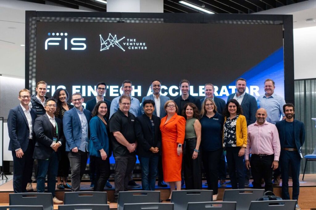Group photo of the FIS Fintech Accelerator team, including program managers, mentors, and partner representatives.
