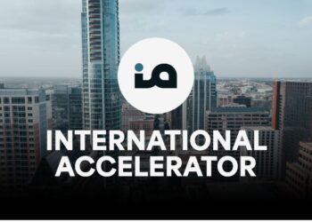 Foreign-born founders collaborating in a startup workspace, representing the International Accelerator’s support ecosystem.