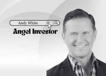 Illustration of investor Andy White reviewing a startup pitch deck on a laptop.