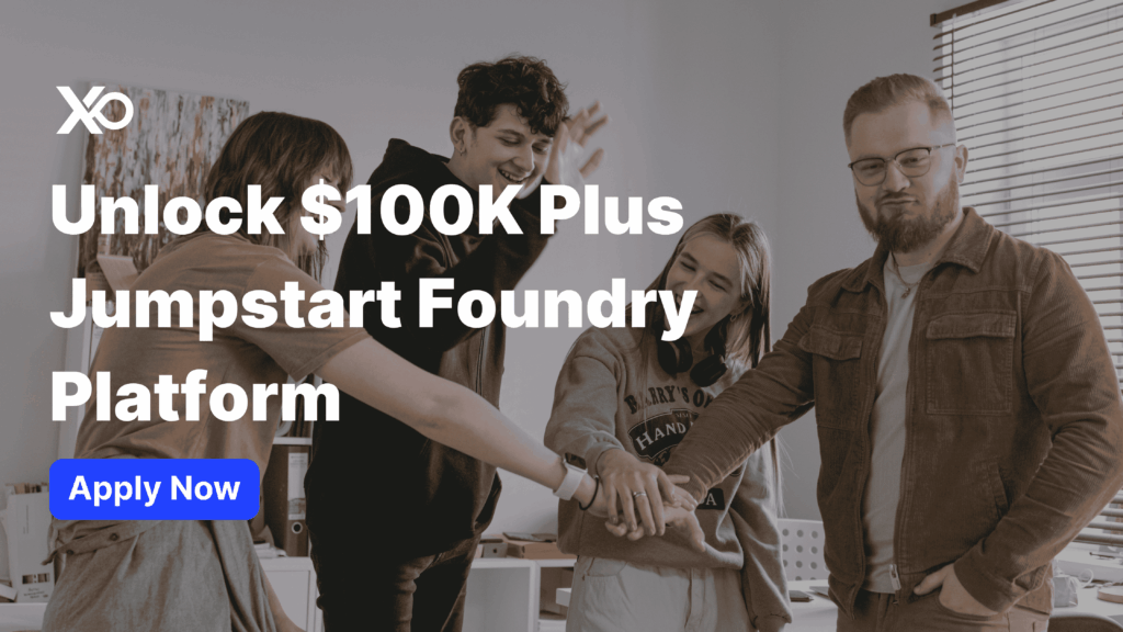 Apply to Jumpstart Foundry accelerator team celebrating funding success in a modern office