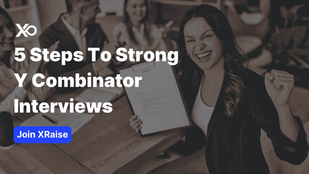 Founder celebrating after successful Y Combinator accelerator interview, holding a contract while the team cheers around a meeting table