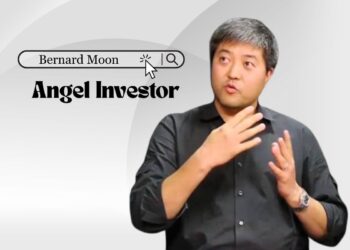 Bernard Moon smiling in a Los Angeles office setting.