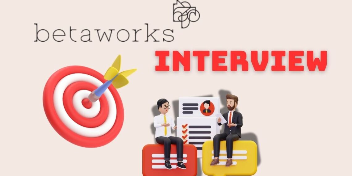 Minimalist illustration representing a founder preparing for a Betaworks Accelerator Interview — laptops open, notes on the desk, focused atmosphere.