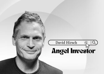 Portrait of angel investor David Hirsch with a confident smile, symbolizing speed, funding, and B2B SaaS investment focus.