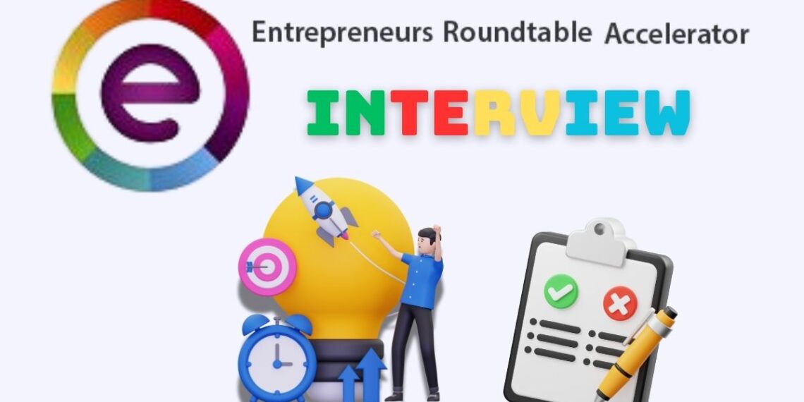 Minimalist illustration representing a founder preparing for a Entrepreneurs Roundtable Accelerator (ERA) Interview — laptops open, notes on the desk, focused atmosphere.