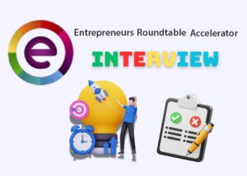 Minimalist illustration representing a founder preparing for a Entrepreneurs Roundtable Accelerator (ERA) Interview — laptops open, notes on the desk, focused atmosphere.