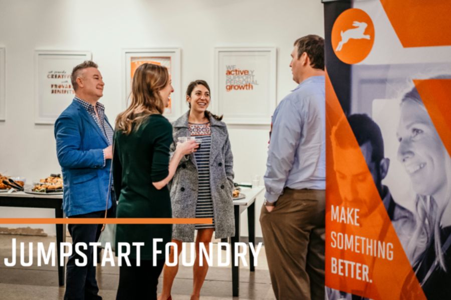 Jumpstart Foundry event snapshot capturing attendees engaged in networking and discussions during a dynamic startup event, demonstrating the energized community surrounding Jumpstart Foundry.  
