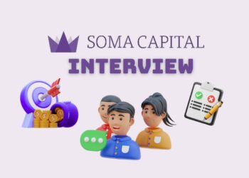 Minimalist illustration representing a founder preparing for a Soma Capital Accelerator Interview — laptops open, notes on the desk, focused atmosphere.