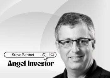 Angel investor Steve Bennet smiling in a coworking space, symbolizing early-stage startup support and funding in Boston and NYC.