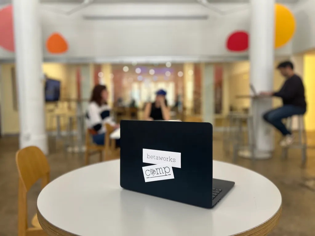 Visual depiction of a Betaworks Accelerator Interview via Zoom, with a founder facing a panel of interviewers, capturing the fast-paced, high-stakes dynamic.