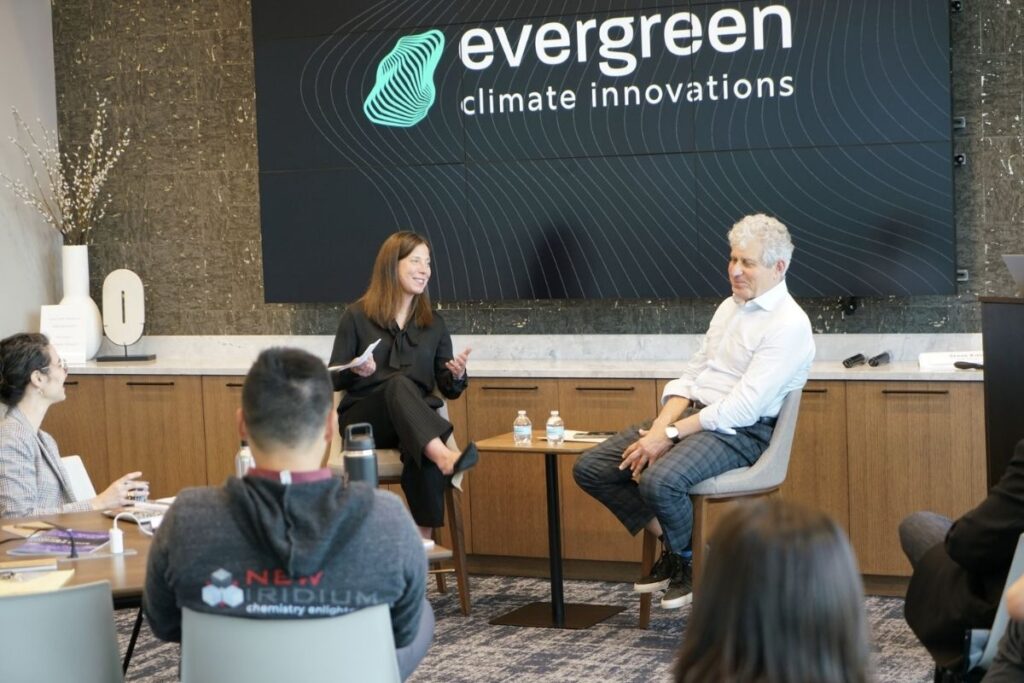 Evergreen Climate Innovations team photo showing diverse professionals collaborating in a bright office setting, embodying innovation and commitment to environmental impact. 