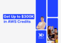 Founders collaborating with a banner showing “Get Up to $300K in AWS Credits” through XRaise.ai.