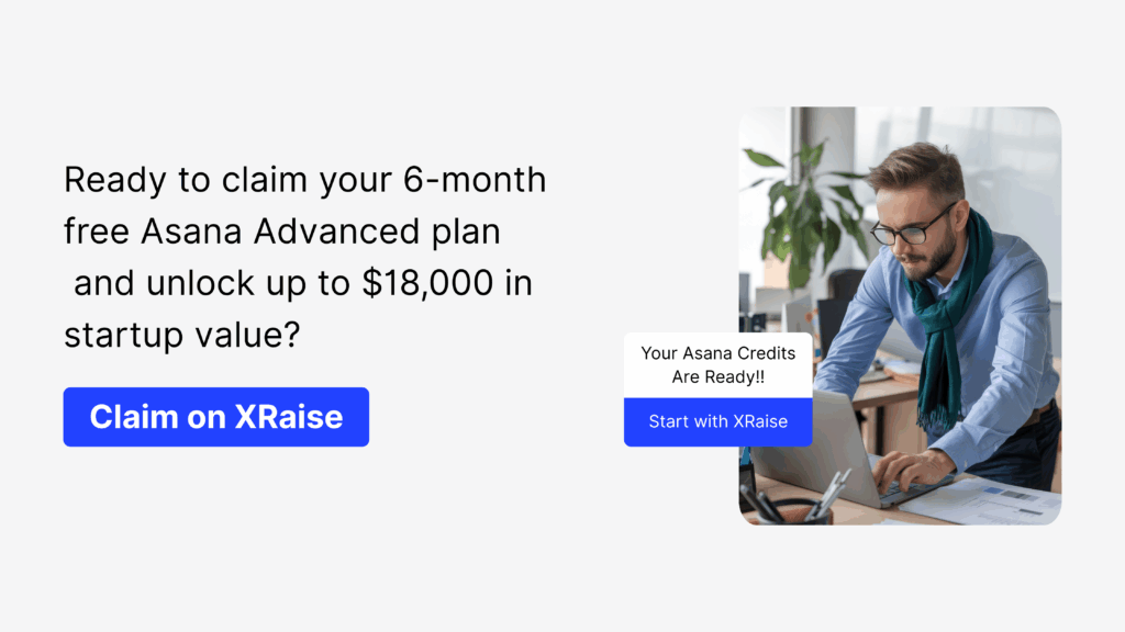 Professional using laptop in modern office promoting six months free Asana Advanced via XRaise for startups.