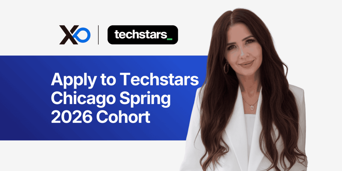 Smiling woman in a white blazer next to a banner inviting founders to apply to the Techstars Chicago Spring 2026 accelerator cohort.