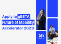 Apply to gBETA Future of Mobility accelerator 2026 with founders collaborating on laptops and tablets