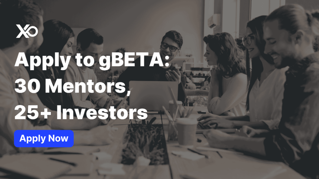 Founders meet at a table to apply to gBETA Future of Mobility accelerator with mentors and investors