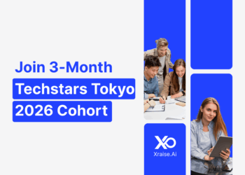 Founders collaborating around a laptop as they apply to Techstars Tokyo accelerator 2026 cohort