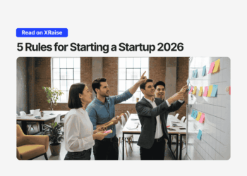 Team planning session for starting a startup in 2026 with founders using sticky notes on a whiteboard