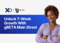 smiling founder in lavender blouse next to banner reading “Unlock 7-Week Growth With gBETA Main Street” with XRaise and gBETA logos