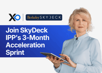 Confident founder holding a tablet beside headline inviting startups to join SkyDeck IPP’s 3-month acceleration sprint.
