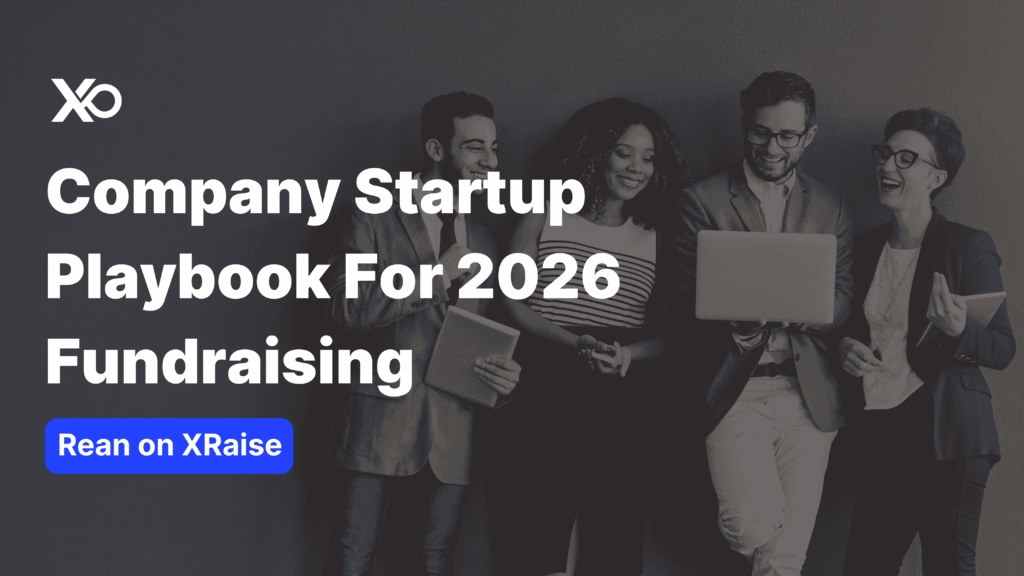 Company startup playbook for 2026 fundraising – diverse team standing together reviewing a laptop