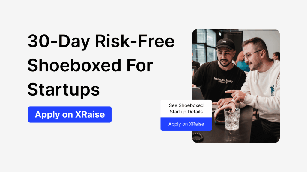 Apply for Shoeboxed 30-day risk-free trial for startups, showing two founders collaborating on a laptop.