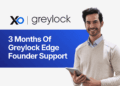 Apply to Greylock Edge founder support banner with smiling male founder holding a tablet on a blue background