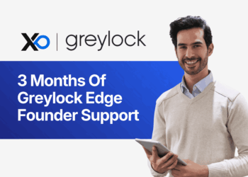 Apply to Greylock Edge founder support banner with smiling male founder holding a tablet on a blue background