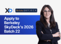 Apply to Berkeley SkyDeck’s 2026 Batch 22 accelerator, featuring a confident woman in a blazer standing beside the program banner.