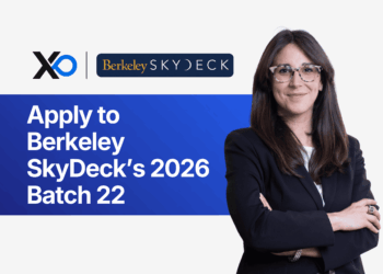 Apply to Berkeley SkyDeck’s 2026 Batch 22 accelerator, featuring a confident woman in a blazer standing beside the program banner.