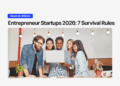 Entrepreneur startups 2026 article banner with diverse team gathered around a laptop.