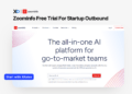 Apply for ZoomInfo free trial for startup outbound on XRaise, showing the ZoomInfo homepage with AI go-to-market platform messaging.