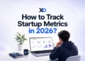 XRaise infographic showing a founder reviewing a laptop dashboard with activation rate, user retention, feature adoption, and revenue signals for startup product analytics