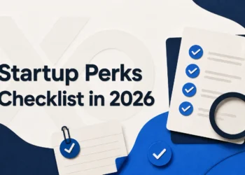 XRaise hero image showing a startup perks checklist with checkmarks, magnifying glass, and blue abstract shapes