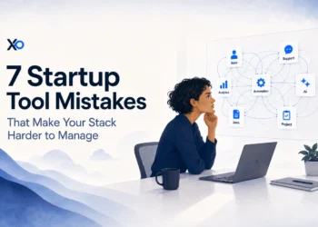Founder reviewing a tangled startup tool stack map with sales, support, automation, AI, docs, and project cards